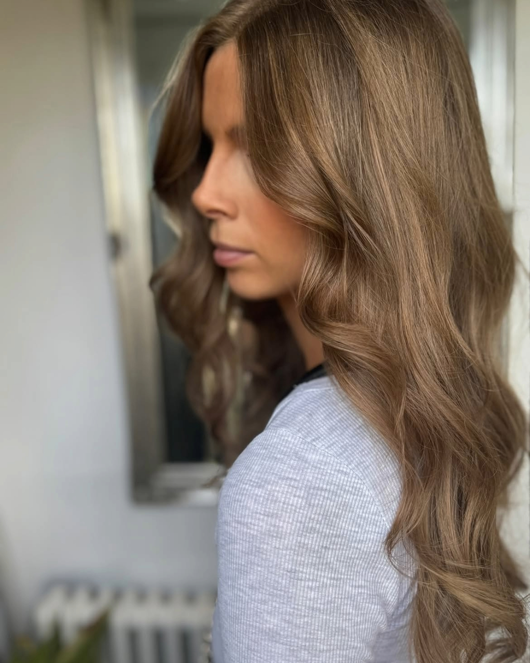 after picture of goregous, glossy, long brown hair colour carried out at cutting room salon Wickersley