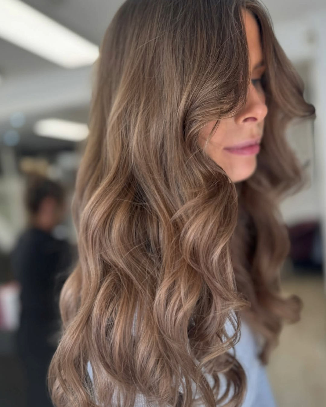 after picture of goregous, glossy, long brown hair colour carried out at cutting room salon Wickersley